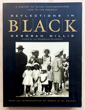 REFLECTIONS IN BLACK: A HISTORY OF BLACK PHOTOGRAPHERS 1840 TO THE PRESENT by Deborah Willis